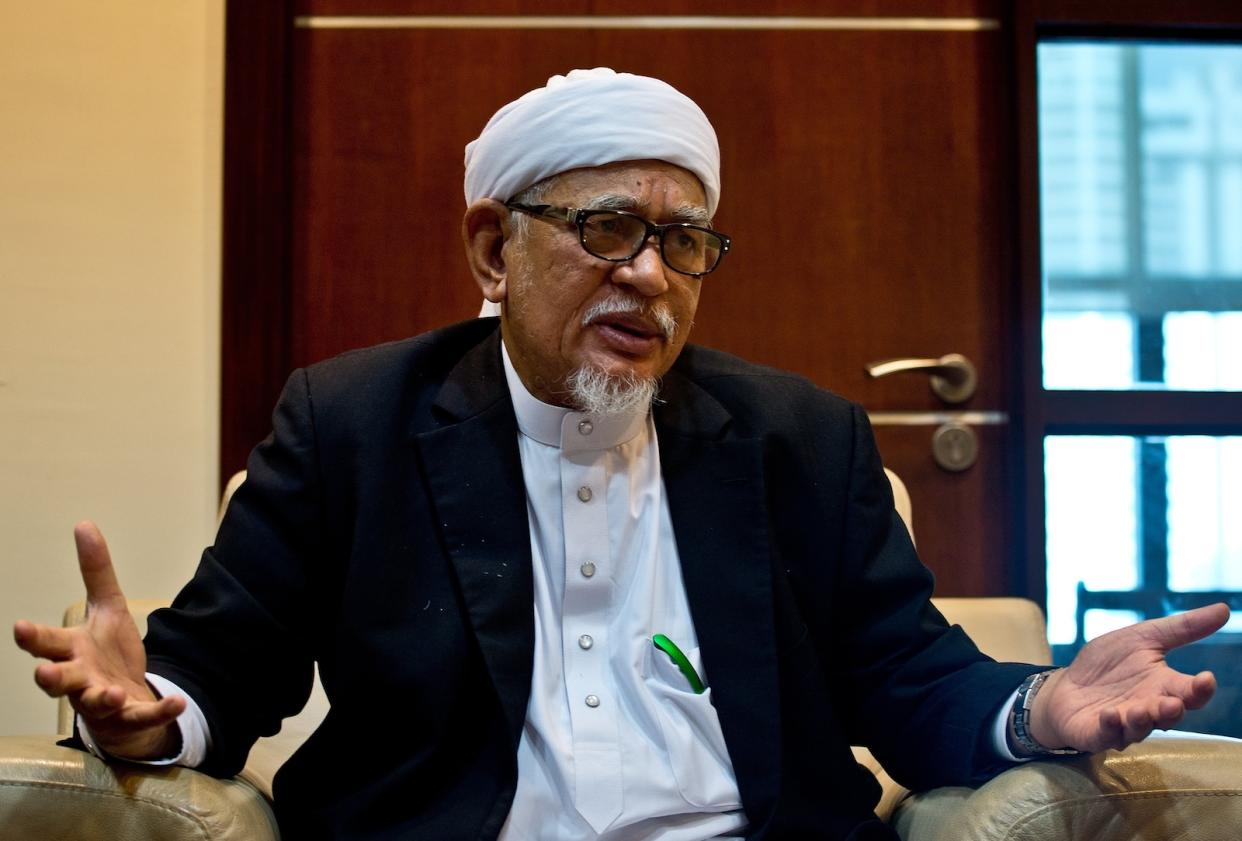 PAS leader, Hadi Awang, at a press conference in Malaysia.