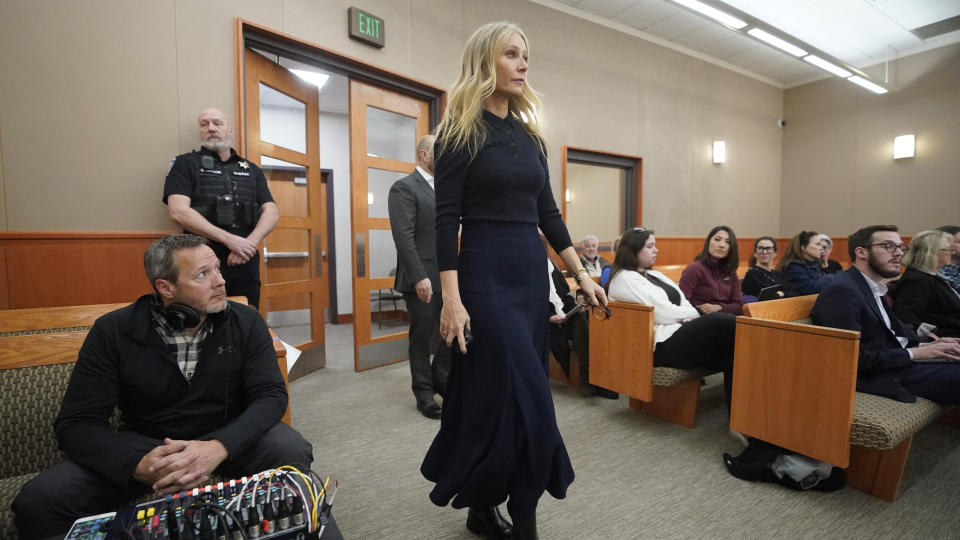 Gwyneth Paltrow enters the courtroom for her trial, Friday, March 24, 2023, in Park City, Utah, where she is charged in a lawsuit with a collision with a skier during a family ski vacation in 2016, which left him with brain damage and four broken ribs.  (AP Photo/Rick Bowmer, Pool)