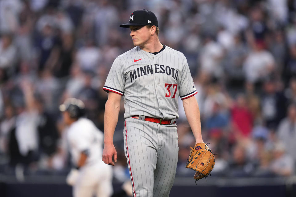 Minnesota Twins starting pitcher Louie Varland (37) waits as New York Yankees' Anthony Volpe runs the bases on a home run during the first inning of a baseball game Friday, April 14, 2023, in New York. (AP Photo/Frank Franklin II)