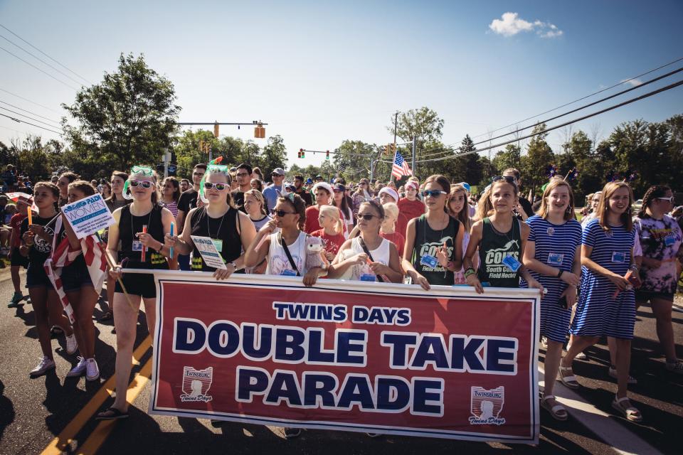 Twins marching in the Double Take Parade in 2019.