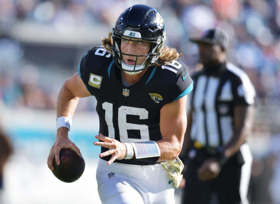 Jacksonville Jaguars quarterback Trevor Lawrence (16) sprints to the end zone for a third quarter touchdown. The Jacksonville Jaguars hosted the Tennessee Titans at EverBank Stadium in Jacksonville, FL Sunday, November 19, 2023. The Jaguars led 13 to 0 at the half and walked away with a 34 to 14 win over the Titans. [Bob Self/Florida Times-Union]