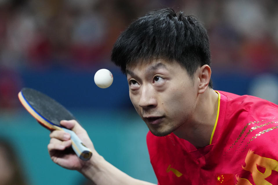 Table tennis player Ma Long makes history for China at Paris Games with