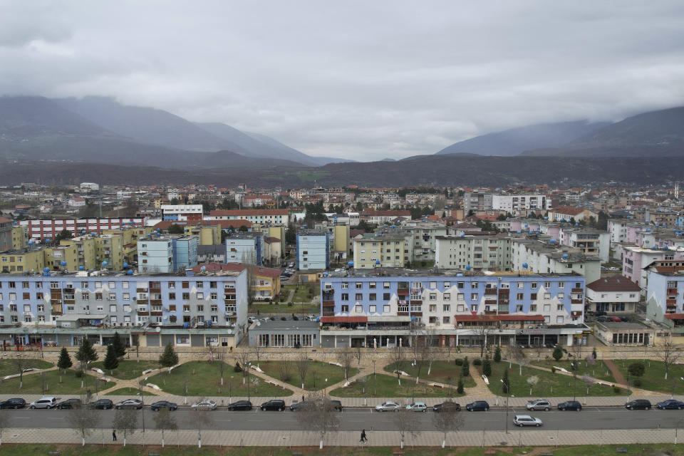 An aerial view of the city of Kukes, 150 kilometers (90 miles) northern of Tirana, Albania, Wednesday, March 15, 2023. Thousands of young Albanians have crossed the English Channel in recent years to seek a new life in the U.K. Their dangerous journey in small boats or inflatable dinghies reflects Albania's anemic economy and a younger generation’s longing for fresh opportunities. (AP Photo/Franc Zhurda)
