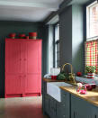 <p> If you are looking for&#xA0;kitchen color ideas&#xA0;but are cautious about committing to boldly bright cabinetry and really&#xA0;colorful kitchen ideas, why not limit your colorful room ideas to just one or two pieces of furniture?&#xA0; </p> <p> Painted kitchen ideas&#xA0;like the one above are a great compromise in the battle of safe choices versus color indulgence: the kitchen itself is an easy to live with deep blue-gray, while the pink pantry gives the room lift and character.&#xA0; </p> <p> Emma Bulmer, head of color consultancy at&#xA0;Edward Bulmer Natural Paint, recommends pairing dusky pinks with deeper hues like this. &apos;It creates high contrast and adds some drama while remaining soft and tonally consistent,&apos; says Emma.&#xA0; </p>