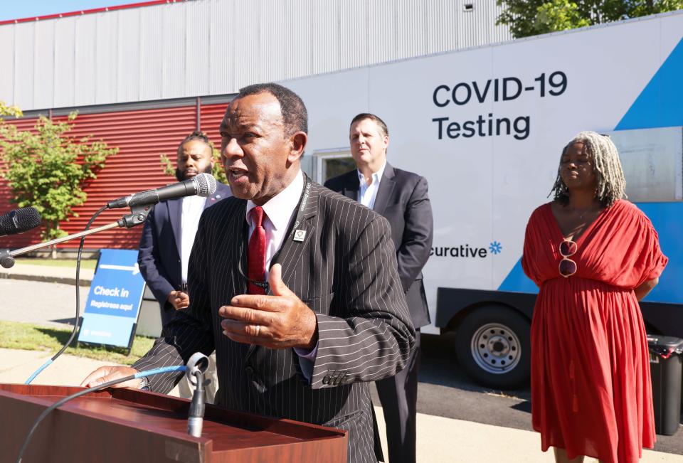 Brockton Board of Health Executive Director Eno Mondesir speaks at a news conference announcing a new COVID-19 PCR testing facility at the Shaw’s Center, located at 1 Feinberg Way, on Friday, Sept. 2, 2022.