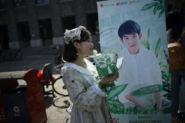 China's boy band sensation TFBoys "The Fighting Boys" are amassing "mother fans" who pretend they stars are their children