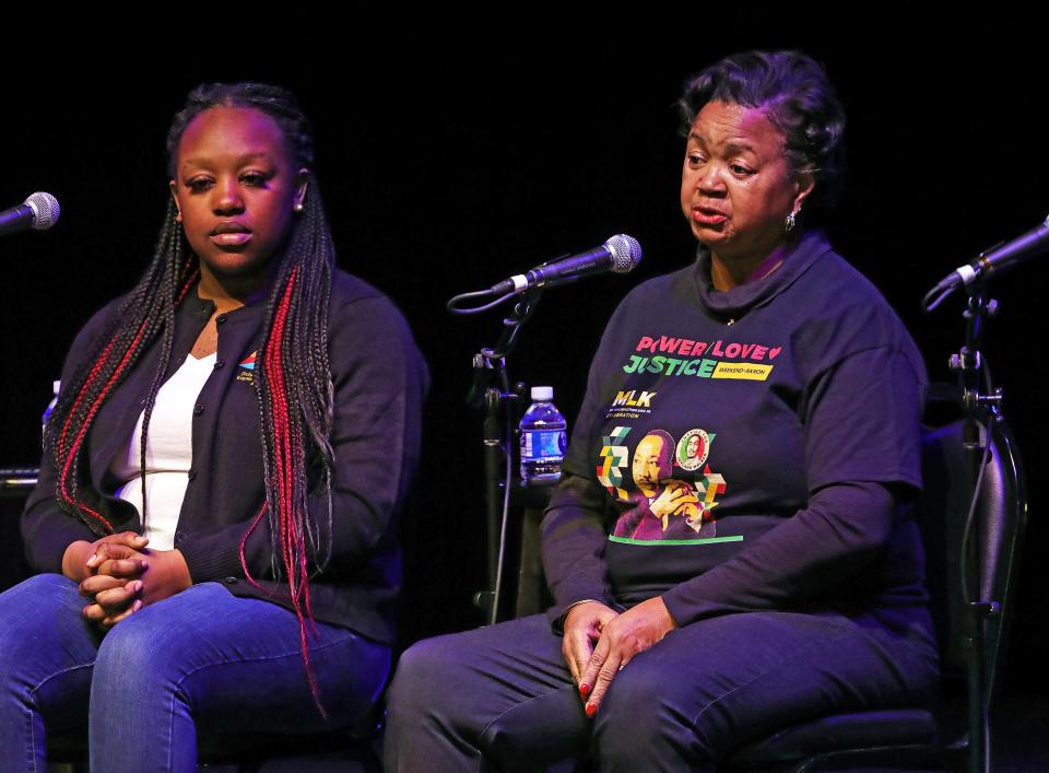 Akron NAACP President Judi Hill speaks at Saturday's symposium.