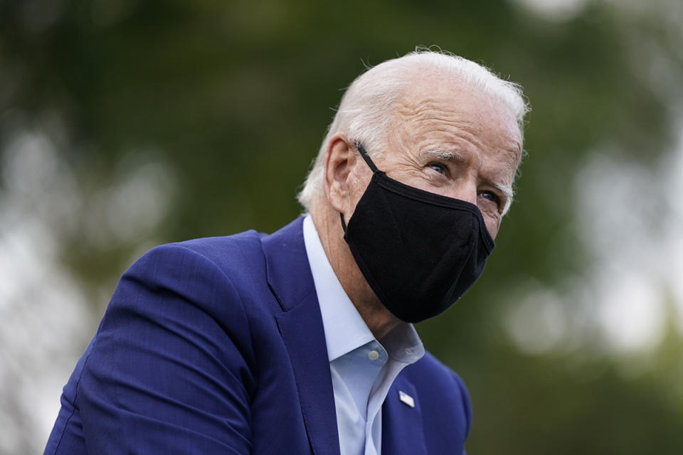 Democratic presidential candidate former Vice President Joe Biden participates in a campaign event with steelworkers in the backyard of a home in Detroit, Wednesday, Sept. 9, 2020. (AP Photo/Patrick Semansky)