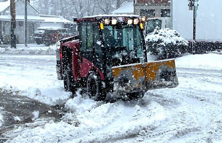 A plow works to clear roads in the snow Tuesday, March 14, 2023 in South Berwick, Maine. A snow storm is in the forecast for Tuesday, Feb. 13, 2024.
