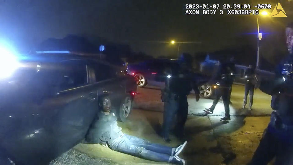 FILE - In this image taken from video released on Jan. 27, 2023, by the city of Memphis, Tenn., Tyre Nichols leans against a car after a brutal attack by five Memphis police officers on Jan. 7, in Memphis. A judge on Thursday, Feb. 8, 2024, pushed back for four months the federal court trial of four former Memphis police officers charged with civil rights violations in the beating death of Nichols. (City of Memphis via AP, File)