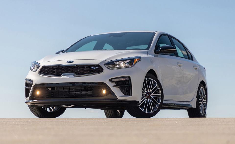 <p>Kia and Hyundai are part of the same company, and the compact <a href="https://www.caranddriver.com/kia/forte" rel="nofollow noopener" target="_blank" data-ylk="slk:Forte;elm:context_link;itc:0;sec:content-canvas" class="link ">Forte</a> shares its chassis and powertrains with the similarly sized <a href="https://www.caranddriver.com/hyundai/elantra" rel="nofollow noopener" target="_blank" data-ylk="slk:Hyundai Elantra;elm:context_link;itc:0;sec:content-canvas" class="link ">Hyundai Elantra</a>. The two are even built on the same assembly line, but it’s the Kia that gets the higher initial quality rating. </p><p>Redesigned last year, we’ve praised the 2020 Forte sedan for its low price, great fuel economy, and long list of standard features. For 2020, it’s available in FE, LXS, GT-Line, EX and the new GT trim levels, but unlike the Elantra, it isn’t offered as a hatchback. Most Fortes have the same 147-hp 2.0-liter four-cylinder and CVT automatic as most Elantras, however the base FE also offers a six-speed manual. At our test track, with the CVT, the Forte required 8.2 seconds to reach 60 mph. Not bad for this class.</p><p>A mechanical twin to the Elentra GT and N Line, the Forte GT gets the same 201-hp turbocharged 1.6-liter four-cylinder and either a six-speed manual or seven-speed dual-clutch automatic. The GT-Line has the looks of the high-performance GT model but is without the turbocharged engine and suspension upgrades.</p>