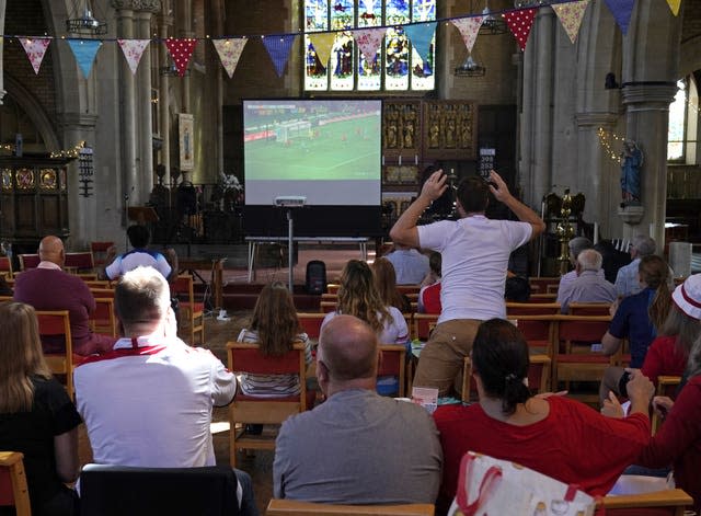 Fans watch Spain v England