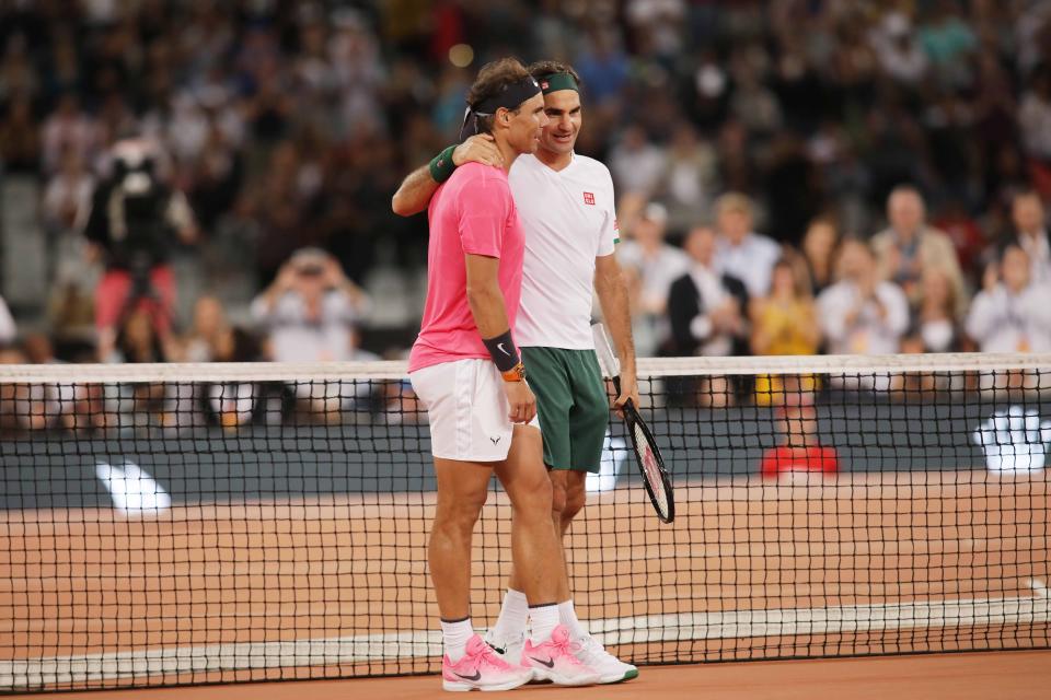 CAPE TOWN, SOUTH AFRICA - FEBRUARY 8 : Roger Federer (R) of Switzerland and Rafael Nadal (L) of Spain play a tennis match at Cape Town Stadium as part of an exhibition game held to support the education of African children, on February 8, 2020 in Cape Town, South Africa. (Photo by Stringer/Anadolu Agency via Getty Images)