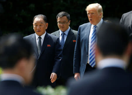 North Korean envoy Kim Yong Chol talks with U.S. President Donald Trump as they walk out of the Oval Office after a meeting at the White House in Washington, U.S., June 1, 2018. REUTERS/Leah Millis