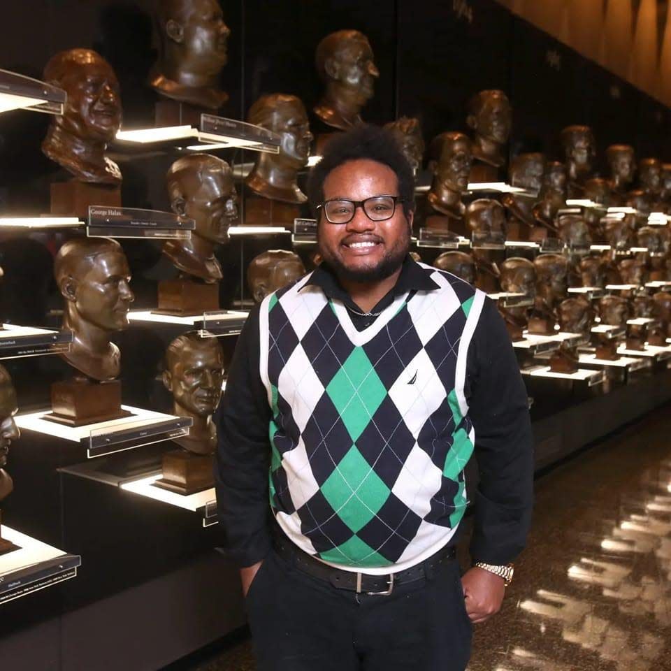 Peter Holland Jr. visits the Pro Football Hall of Fame on his first day working at The Canton Repository, Jan. 31, 2022.