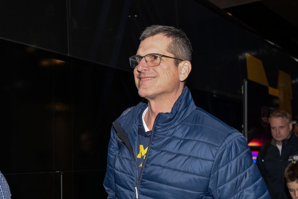 Michigan Wolverines head coach Jim Harbaugh arrives at Hilton Americas in Houston on Friday, Jan. 5, 2024.