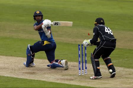 New Zealand v Sri Lanka - ICC Champions Trophy Warm Up Match - Edgbaston - 30/5/17 Sri Lanka's Dinesh Chandimal is bowled out by New Zealand's Colin de Grandhomme (not pictured) Action Images via Reuters / Andrew Boyers Livepic