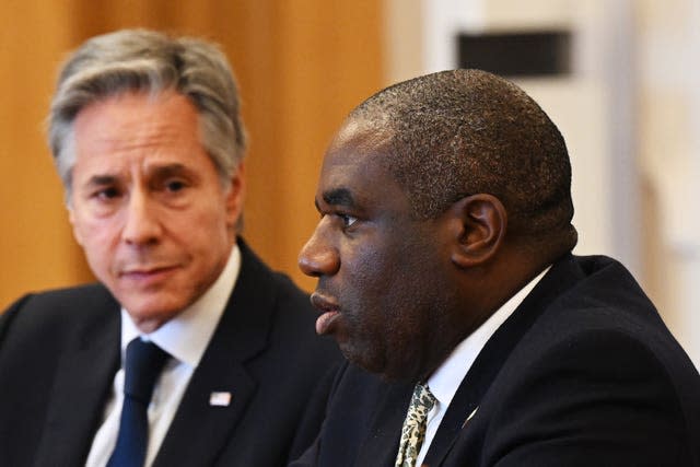 US Secretary of State Antony Blinken (left) listens as Foreign Secretary David Lammy (right) speaks