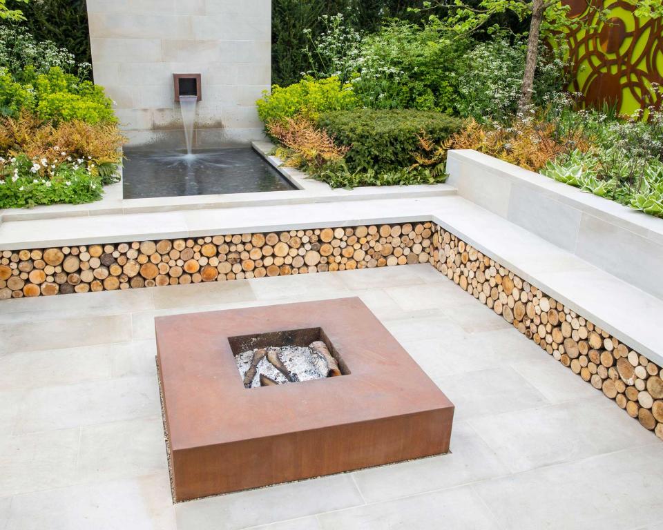 10. Add a textural touch to your patio's edging with logs