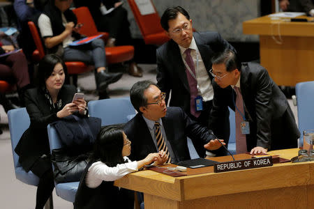 South Korean ambassador to the United Nations (UN) Cho Tae-yul speaks with members of his staff before a meeting of the UN Security Council to discuss a North Korean missile launch at UN headquarters in New York, U.S., November 29, 2017. REUTERS/Lucas Jackson