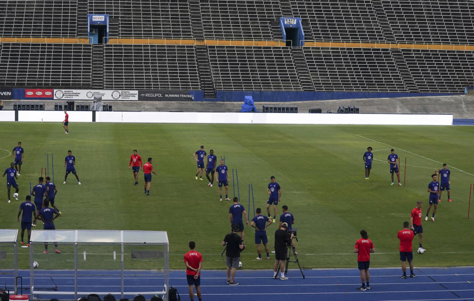 United States' players warm up during a training session ahead of the World Cup 2022 qualifying soccer match against Jamaica in Kingston, Monday, Nov. 15, 2021.(AP Photo/Fernando Llano)