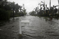 <p><strong>Naples</strong><br> A street is flooded as Hurricane Irma passes through Naples, Fla., Sept. 10, 2017. (Photo: David Goldman/AP) </p>