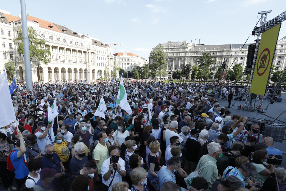 Protesters gather in downtown Budapest, Hungary, Saturday, June 5, 2021. Thousands of people gathered opposing the Hungarian government's plan of building a campus for China's Fudan University in Budapest. (AP Photo/Laszlo Balogh)
