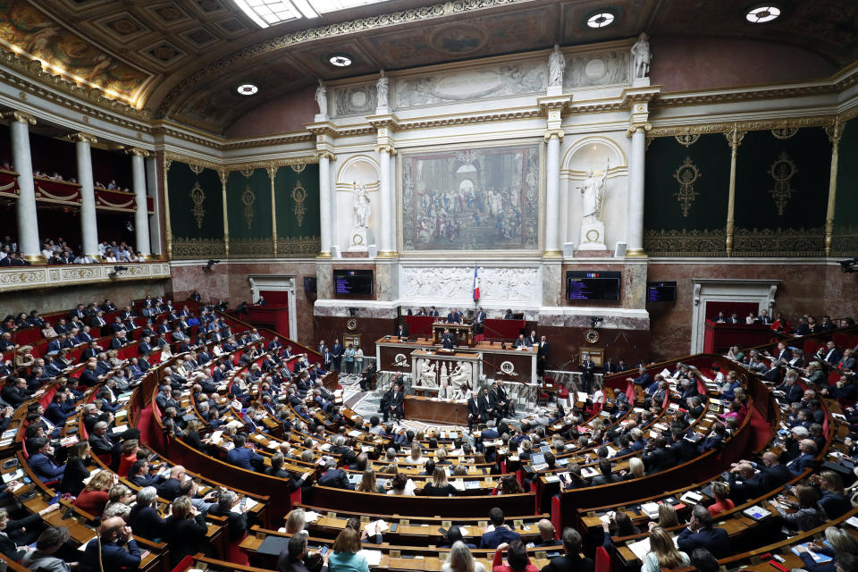 France's Prime Minister Edouard Philippe delivers a speech at the National Assembly, in Paris, Wednesday, June 12, 2019. France's prime minister vowed to keep reforming the country's economy through changes to the unemployment benefits, the pension system and tax cuts for middle-class workers. Edouard Philippe laid down Wednesday the government's upcoming priorities at the lower house of parliament, the National Assembly. (AP Photo/Thibault Camus)