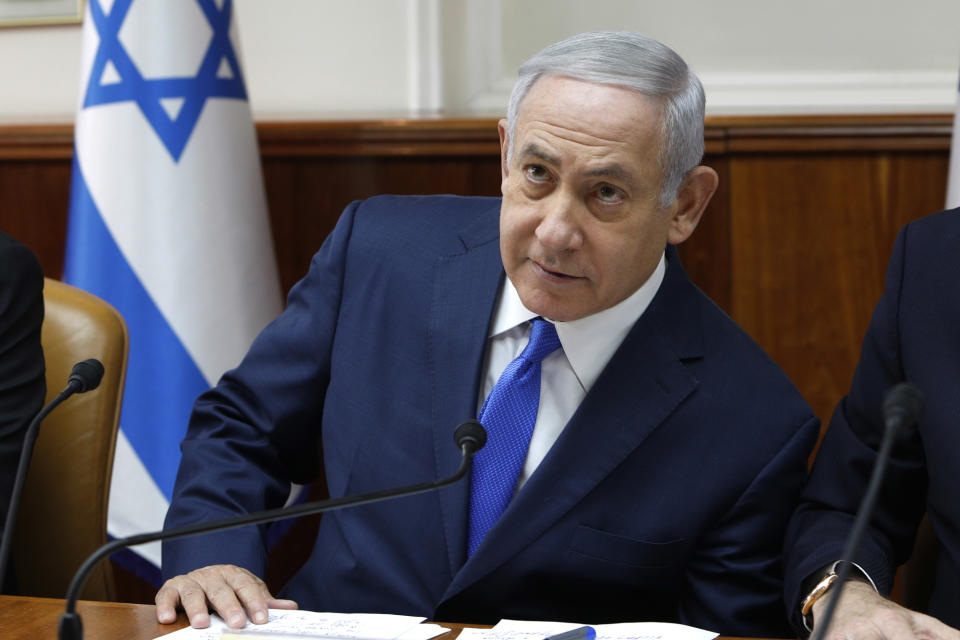 Israeli Prime Minister Benjamin Netanyahu attends the weekly cabinet meeting at his office in Jerusalem, Sunday Dec. 2, 2018. Israeli police on Sunday recommended indicting Prime Minister Netanyahu on bribery charge allegations related to a corruption case involving Israel's Bezeq telecom giant. (Gali Tibbon/Pool via AP)