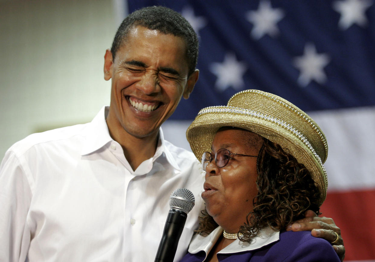 FILE - Presidential hopeful Sen. Barack Obama, D-Ill., left, laughs with Greenwood County, S.C., Council Woman, Edith Childs, right, in Aiken, S.C., on Oct. 6, 2007. Obama is marking the retirement of the South Carolina woman credited with popularizing the chant "Fired up, ready to go!" The chant came to epitomize Obama's two presidential campaigns. The former president says Childs' energy played a key role in lifting his spirits and his candidacy. (AP Photo/Brett Flashnick, File)