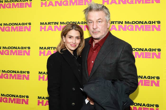 Hilaria and Alec Baldwin stand together at a red carpet event