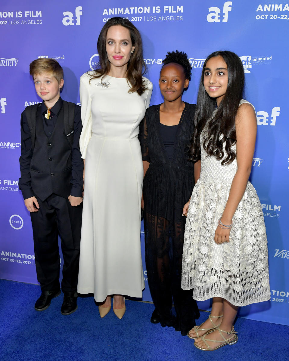 The 42-year-old actress was all smiles at the premiere of 'The Breadwinner,' holding hands with her two oldest daughters.