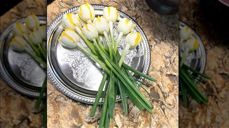 deviled egg tulips on silver platter