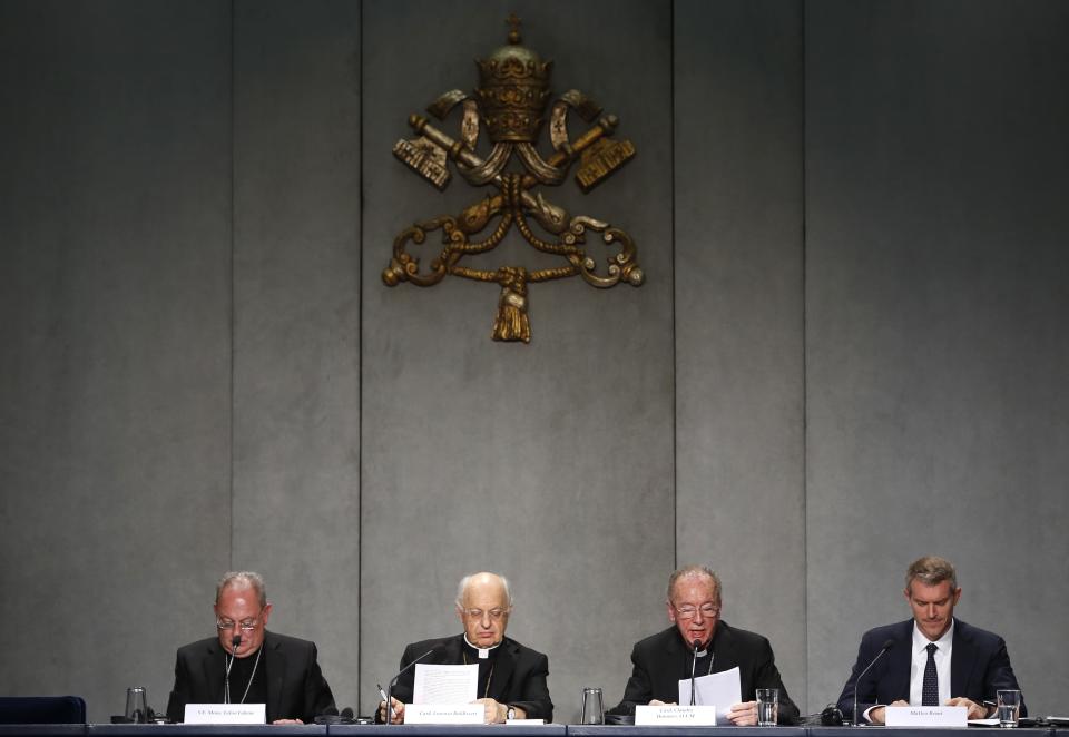 From left, Mons. Fabio Fabene, Brazilian Cardinal Claudio Hummes, General Rapporteur for the Synod of Bishops for the Pan-Amazon region, Cardinal Lorenzo Baldisseri, Secretary General of the Synod of Bishops and Vatican spokesperson Matteo Bruni give a press conference announcing the synod, at the Vatican, Thursday, Oct. 3, 2019. The meeting, which opens on Oct. 6, will discuss social and environmental problems faced by the inhabitants of the Amazon, including the increasing rate of deforestation in the region. (AP Photo/Domenico Stinellis)