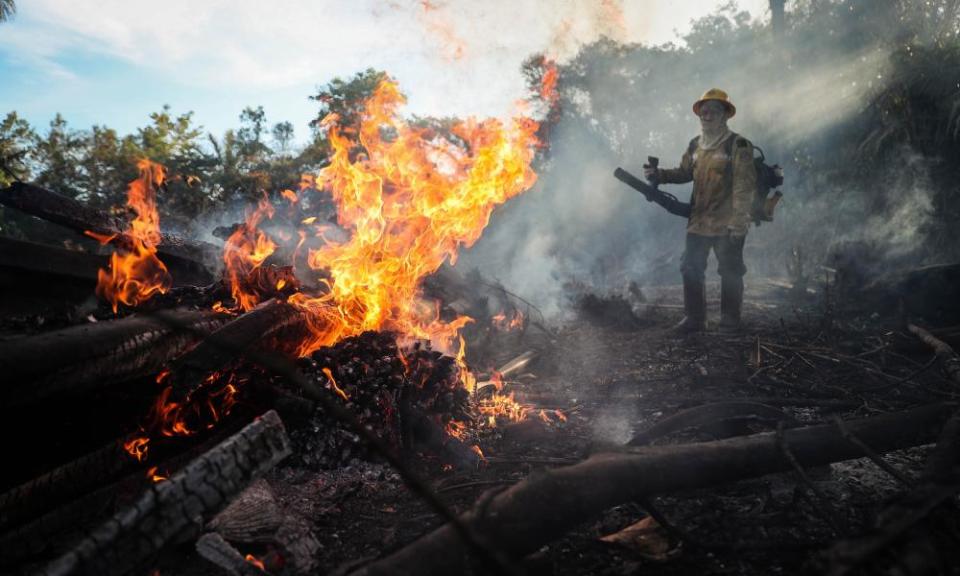 Firefighters battle blazes in an Indigenous reserve located in Humaitá, state of Amazonas, Brazil, on 7 September.