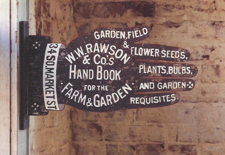 In this photo provided by Farmhouse Wares, reproduction and original antique signage and labels are part of the vintage garden look. This metal sign from Farmhouse Wares, printed on both sides, is wall art with graphic punch and old fashioned charm. Those drawn to 19th-century style may be happy to learn that vintage garden decor is a trend for spring and summer. (AP Photo/Farmhouse Wares)