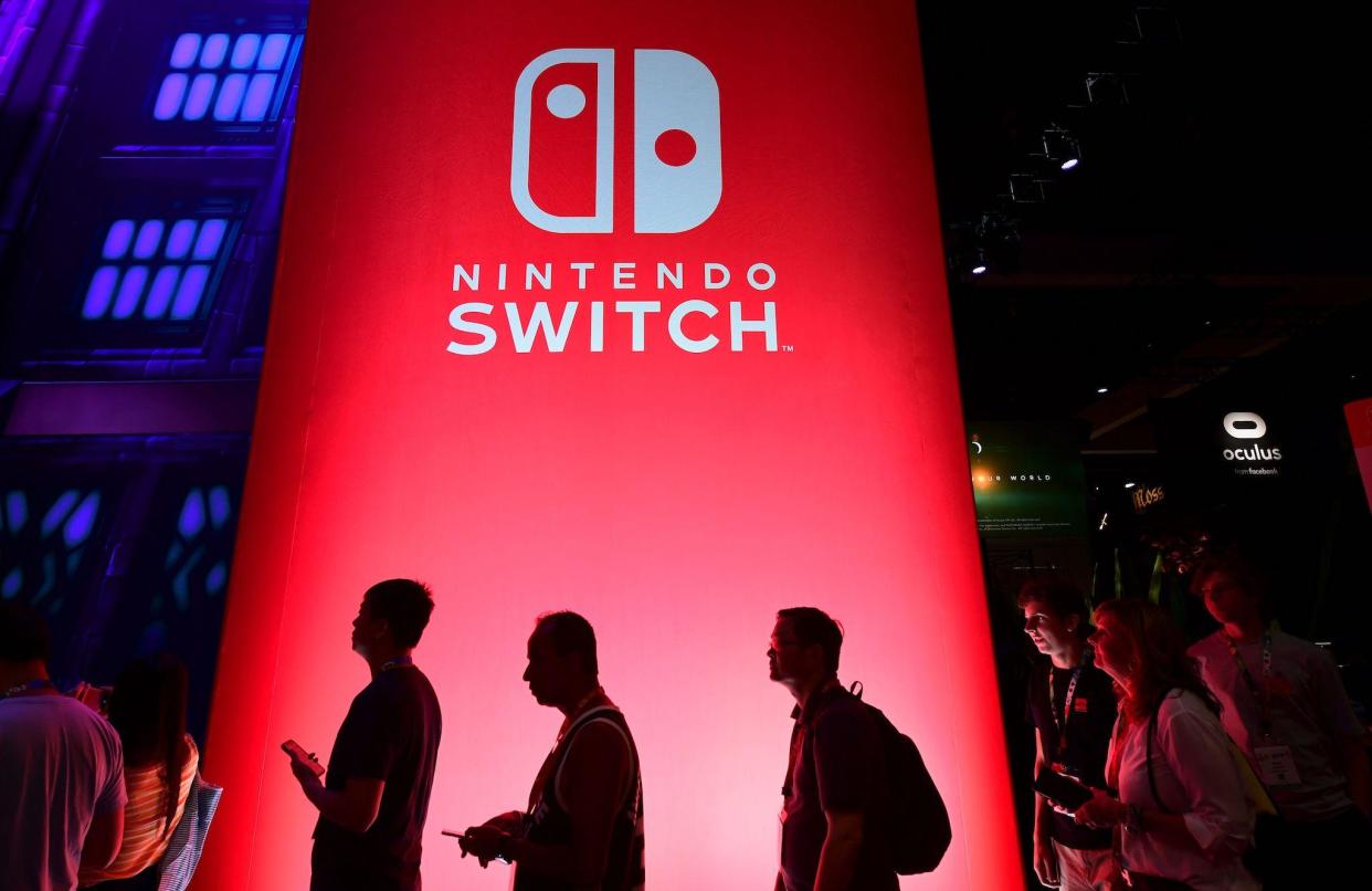 People wait in line for a chance to sample new games for Nintendo Switch at the 2019 Electronic Entertainment Expo, also known as E3, opening in Los Angeles, California on June 11, 2019: FREDERIC J. BROWN/AFP via Getty Images