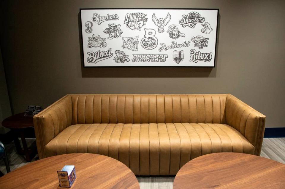 Art from the original logo design process for the Biloxi Shuckers on display in the recently renovated Sparklight Lounge at Shuckers Ballpark, on Friday, May 10, 2024. The lounge is included with tickets in the first few rows behind home plate and includes food.