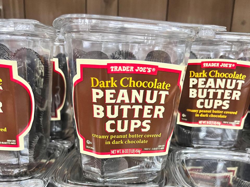 Containers of Trader Joe's dark-chocolate peanut-butter cups on display.