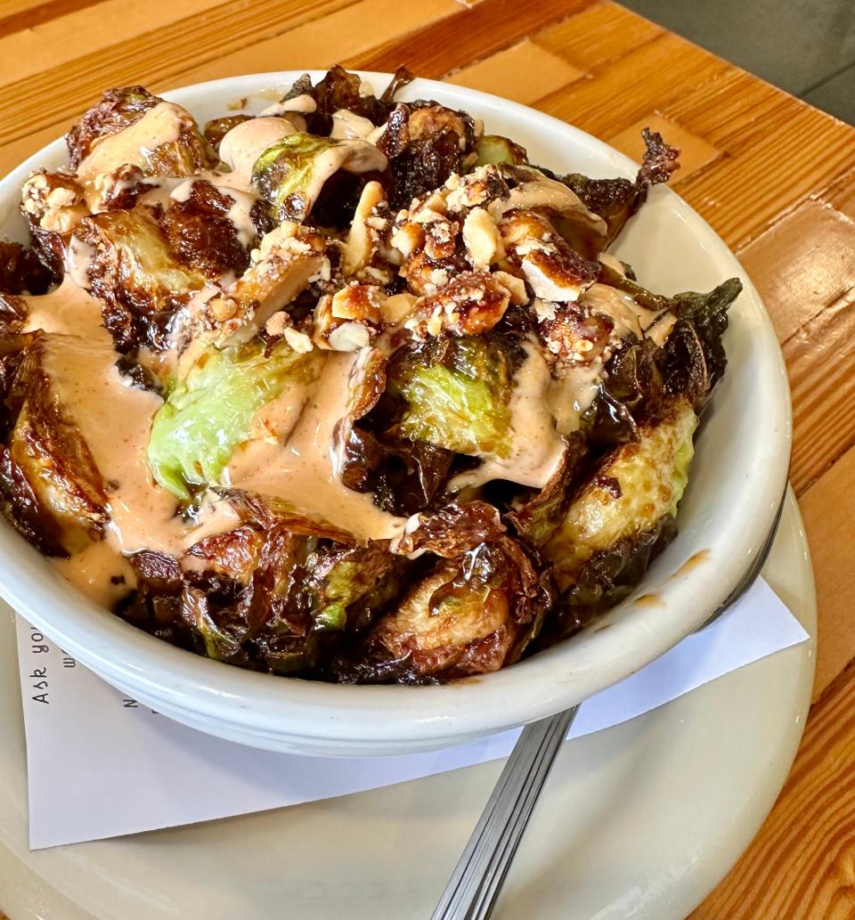 General Tso's Brussels sprouts with candied peanuts are the perfect accompaniment to a craft brew at UnHitched Brewing Co. in Louisville.