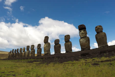 Statues named "Moai" are seen on a hill at the Easter Island, Chile January 31, 2019. Picture taken January 31, 2019. REUTERS/Jorge Vega