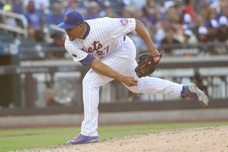 Jul 14, 2018; New York City, NY, USA; New York Mets relief pitcher Jeurys Familia (27) delivers a pitch during the ninth inning against the Washington Nationals at Citi Field. Mandatory Credit: Anthony Gruppuso-USA TODAY Sports