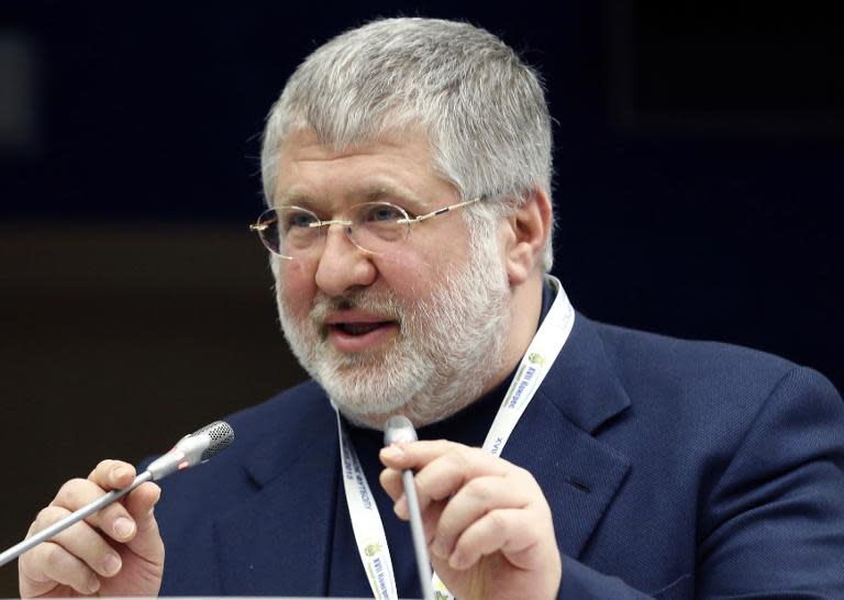 A picture taken in March 2015 by Unian agency shows Ukrainian billionaire Igor Kolomoisky speaking during the Ukrainian Football Federation session in Kiev