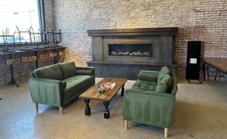 The back of the Greater Grounds Coffee & Co. space is fitted with a fireplace.