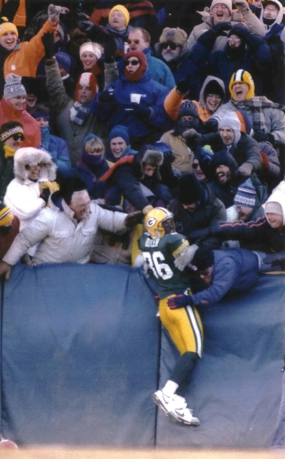 An Unusual Play led to an unusual  reception and l an unusual situation. LeRoy Butler scored on a lateral from Reggie White, who scooped up a Raiders' fumble. It helped seal the Packers' 28 - 0 victory over the Raiders on Sunday, Dec. 26, 1993 at Lambeau Field. It propelled Green Bay to their first playoff berth in 11 years. Fans celebrated with Butler after he jumped into the stands. This was the original Lambeau Leap.