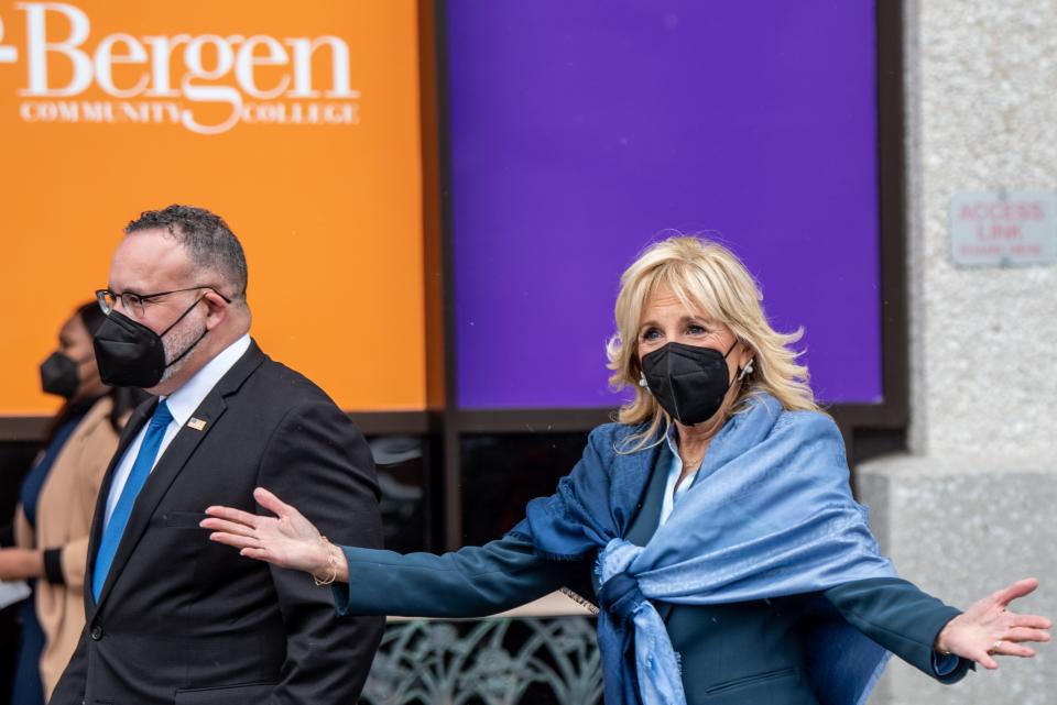 First Lady Jill Biden visits Bergen Community College in Paramus on Thursday Jan. 20, 2022. Biden gestures as she arrives with U.S. Secretary of Education Miguel Cardona.