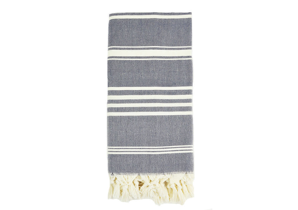 <p>Turkish T Towel, $54, <a rel="nofollow noopener" href="http://www.turkish-t.com/collections/beach/products/original-natural-bath" target="_blank" data-ylk="slk:turkish-t.com;elm:context_link;itc:0;sec:content-canvas" class="link ">turkish-t.com</a></p>