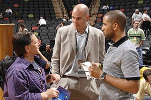 Former Cavs GM Danny Ferry (center) never wanted to fire coach Mike Brown, but owner Dan Gilbert (left) knew LeBron James and his business manager Maverick Carter (right) wanted Brown out as far back as 2009