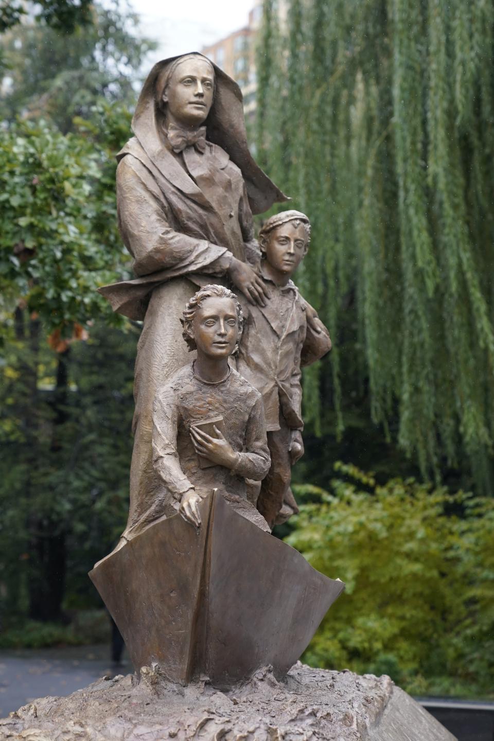 A statue of the patron saint of immigrants, Mother Frances Cabrini, is on display Monday, Oct. 12, 2020, in New York. (AP Photo/Frank Franklin II)