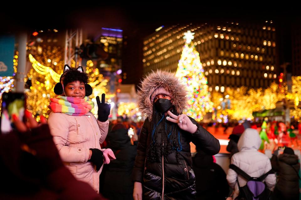 Nyla Rozzell, right, of Detroit, and Johnna Philot-Dixon pose for a photo during the 19th annual Detroit Tree Lighting presented by the DTE Foundation on Friday, Nov. 18, 2022, at Campus Martius Park in downtown Detroit.
